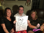 Tokio Marine HCC Christmas Party guests showing their Caricatures 03